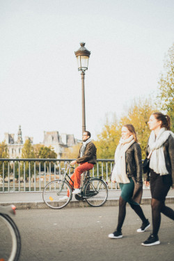 Photo of two people walking. Photo by Elina Sazonova.